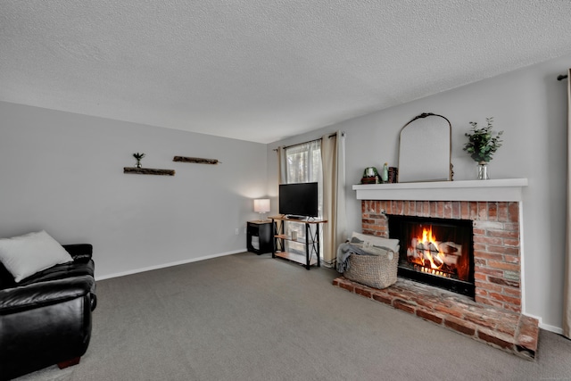 carpeted living area with baseboards, a textured ceiling, and a brick fireplace