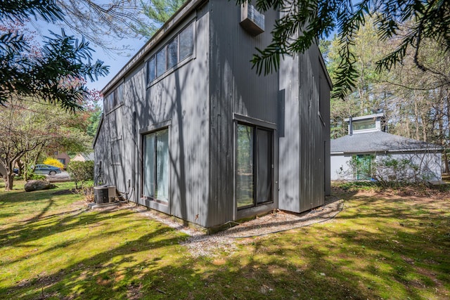 view of outbuilding with central air condition unit
