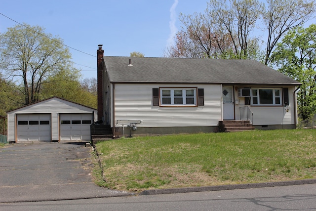 ranch-style house with an outdoor structure, a garage, a chimney, entry steps, and a wall mounted AC