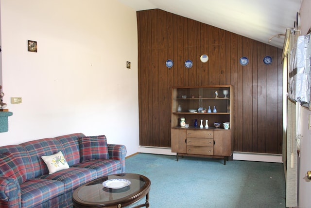 carpeted living area featuring wood walls, baseboard heating, and lofted ceiling