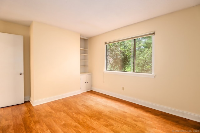 920 Heritage Vlg Unit A, Southbury, CT 06488 - spare room featuring light wood-style flooring and baseboards