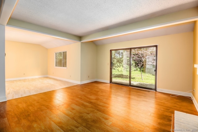 920 Heritage Vlg Unit A, Southbury, CT 06488 - spare room with wood finished floors and a textured ceiling