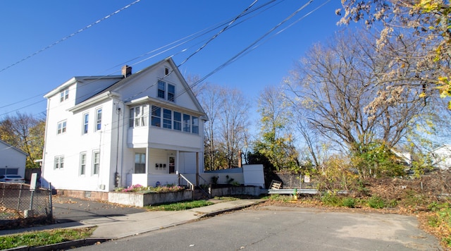 35 Clinton Ave, Middletown, CT 06457 - view of property exterior featuring a chimney