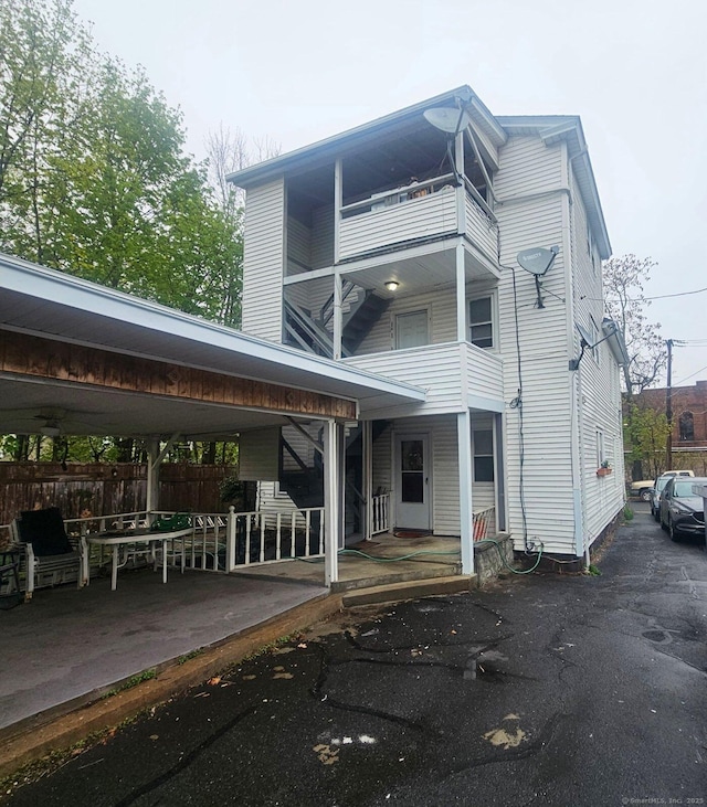 35 Clinton Ave, Middletown, CT 06457 - rear view of house with fence