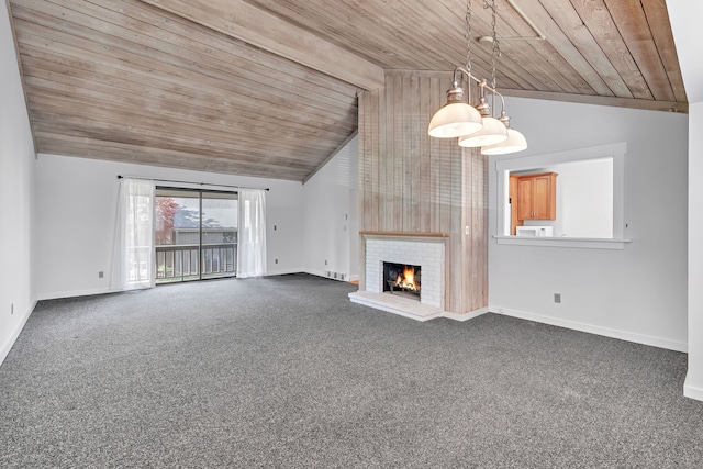 unfurnished living room with a brick fireplace, baseboards, wooden ceiling, and dark carpet