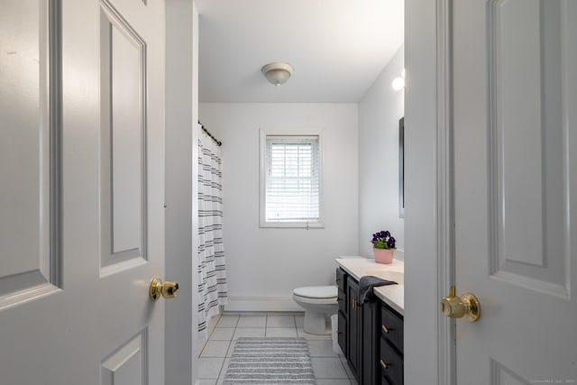full bath featuring vanity, tile patterned flooring, toilet, and a shower with shower curtain