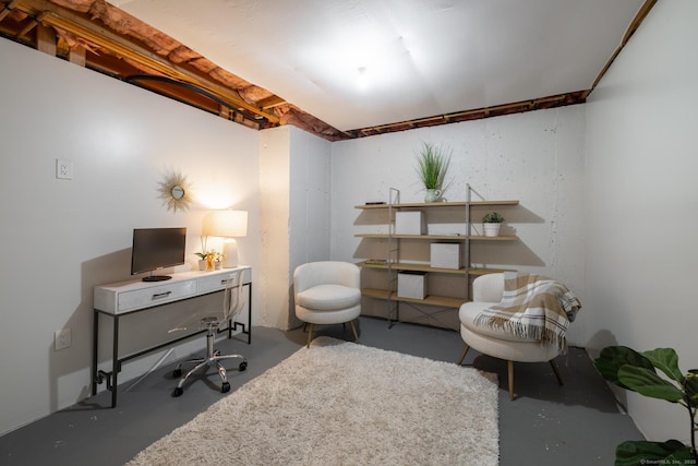 office area featuring finished concrete flooring