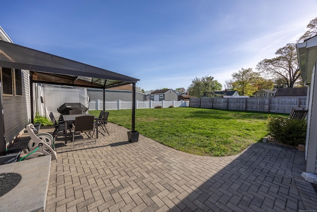 view of patio / terrace with outdoor dining area, a fenced backyard, and grilling area