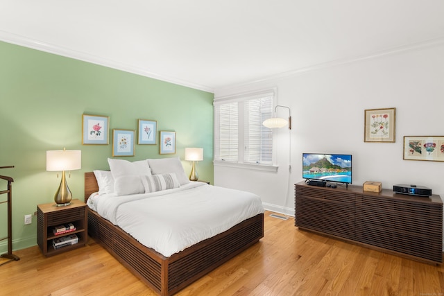 33 Hale Ln Unit 33, Darien, CT 06820 - bedroom featuring baseboards, ornamental molding, and wood finished floors