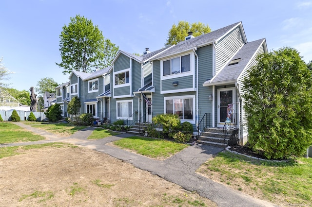 9 Farview Ave Unit 2-9, Danbury, CT 06810 - view of property featuring a chimney, a residential view, and a shingled roof