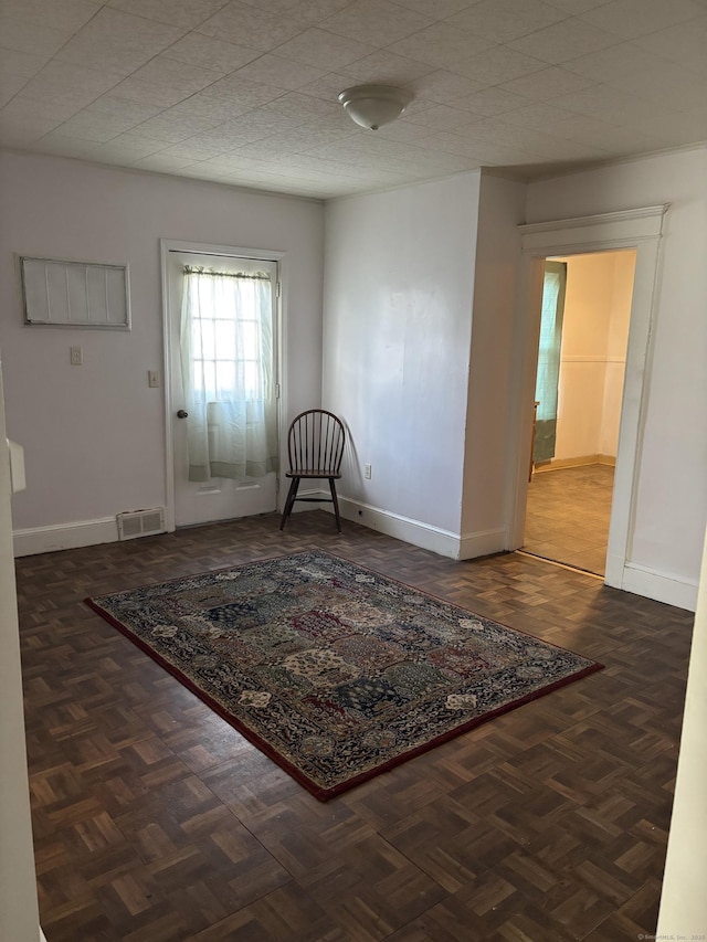 interior space featuring visible vents and baseboards