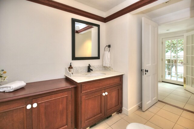 53 Sylvan Rd N, Westport, CT 06880 - bathroom with tile patterned floors, vanity, and baseboards