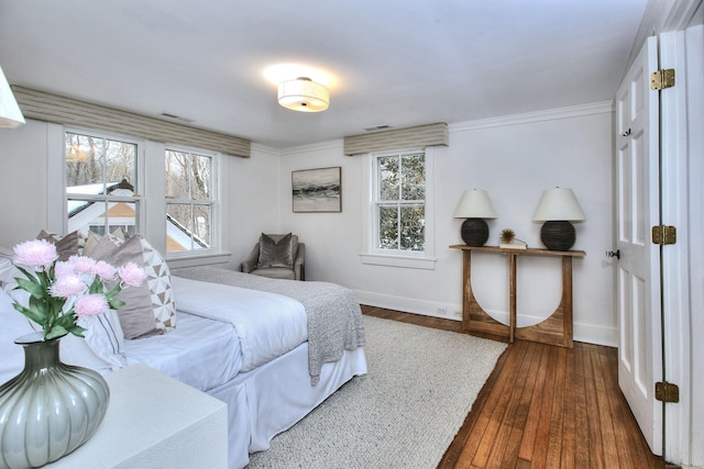 53 Sylvan Rd N, Westport, CT 06880 - bedroom with multiple windows, baseboards, and hardwood / wood-style flooring