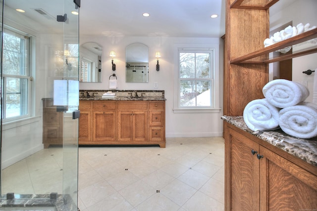 53 Sylvan Rd N, Westport, CT 06880 - bathroom with baseboards, plenty of natural light, vanity, recessed lighting, and a shower with shower door