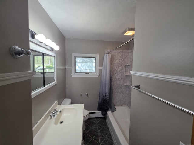 full bathroom featuring shower / bath combo, a sink, tile patterned floors, a baseboard radiator, and toilet