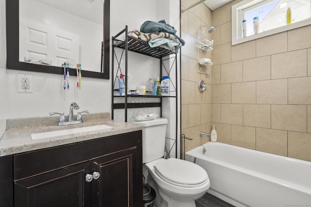 full bathroom with vanity, toilet, and shower / washtub combination