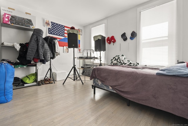 bedroom with wood finished floors