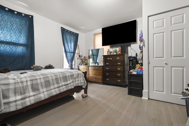 bedroom with light wood-style flooring