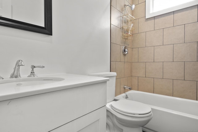 full bath featuring vanity, toilet, and shower / washtub combination