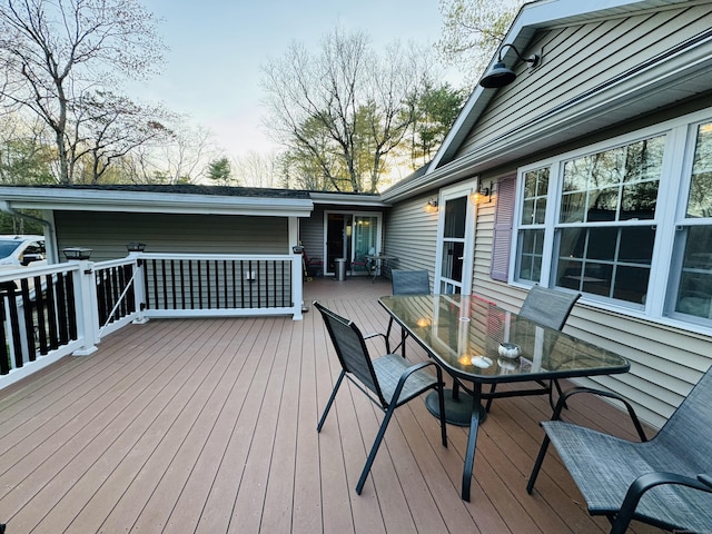 deck with outdoor dining space