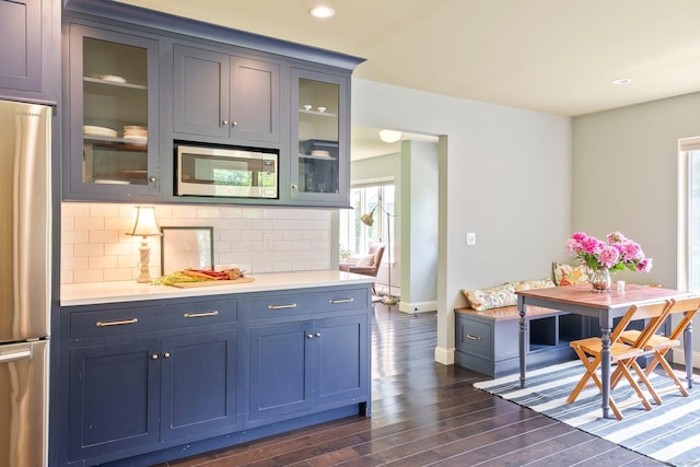 53 Upland Meadow Rd, Salisbury, CT 06068 - kitchen with appliances with stainless steel finishes, dark wood finished floors, tasteful backsplash, recessed lighting, and light countertops