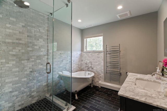 53 Upland Meadow Rd, Salisbury, CT 06068 - full bath featuring radiator heating unit, a shower stall, baseboard heating, a soaking tub, and vanity