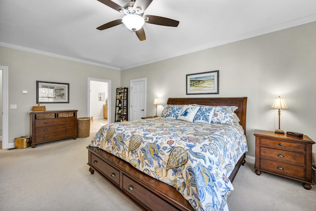 bedroom featuring a ceiling fan, light colored carpet, baseboards, connected bathroom, and ornamental molding