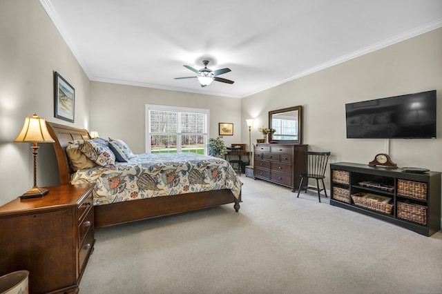carpeted bedroom featuring ornamental molding, a ceiling fan, and multiple windows