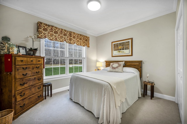 bedroom featuring baseboards, light colored carpet, and ornamental molding