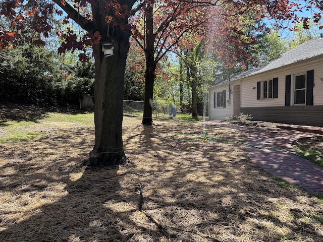 view of yard featuring fence