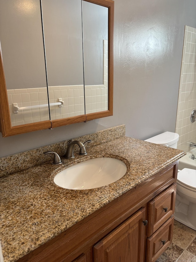 full bath with vanity, bathing tub / shower combination, and toilet