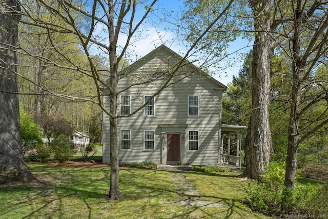 212 Main St N, Woodbury, CT 06798 - rear view of house with a lawn
