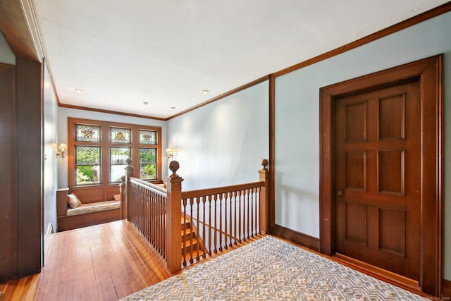 836 Prospect Ave, Hartford, CT 06105 - foyer featuring wood finished floors, ornamental molding, and baseboards