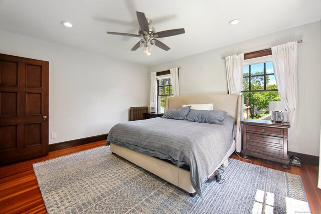 836 Prospect Ave, Hartford, CT 06105 - bedroom featuring radiator, wood finished floors, baseboards, and recessed lighting