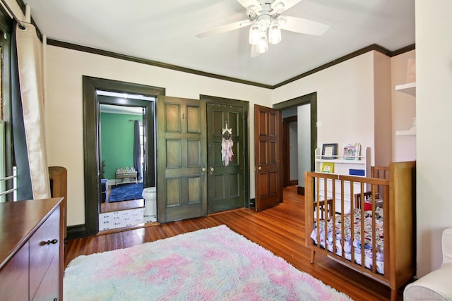 836 Prospect Ave, Hartford, CT 06105 - bedroom featuring ornamental molding, wood finished floors, and a closet