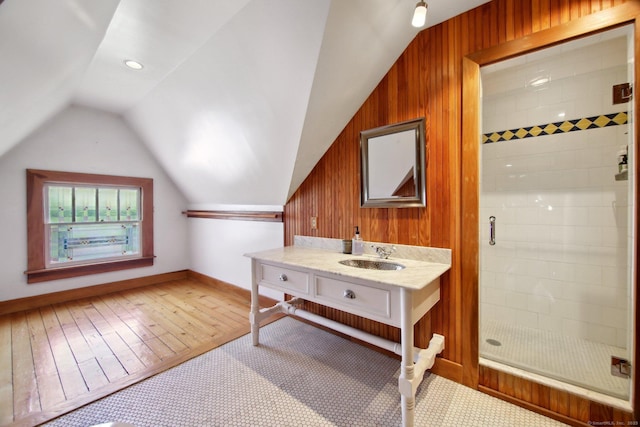 836 Prospect Ave, Hartford, CT 06105 - full bath with a stall shower, lofted ceiling, hardwood / wood-style floors, baseboards, and vanity
