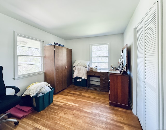 office with light wood-style flooring