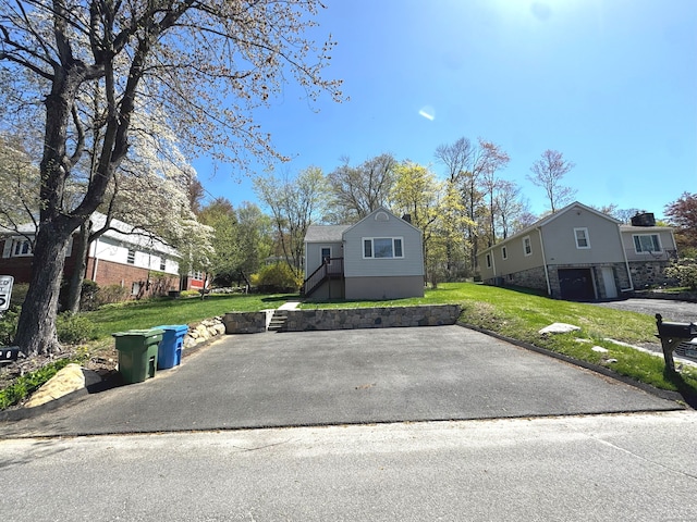 6 Fulton Dr, New Fairfield, CT 06812 - exterior space with an attached garage and aphalt driveway