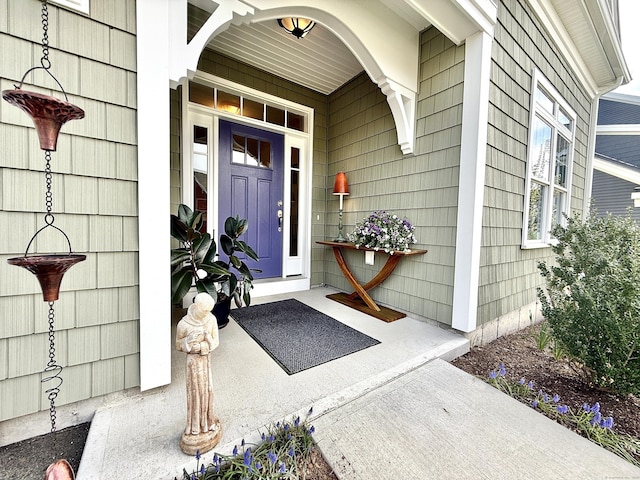 property entrance featuring a porch