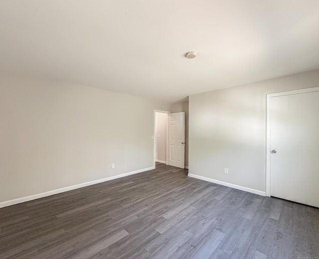 139 Downes St Unit 139, Waterbury, CT 06704 - empty room featuring baseboards and dark wood finished floors