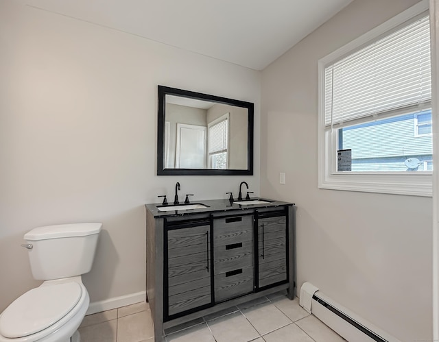 139 Downes St Unit 139, Waterbury, CT 06704 - bathroom with toilet, tile patterned floors, a sink, and baseboard heating