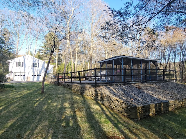 view of yard with a garage