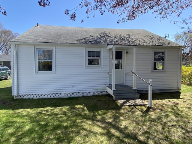 318 Billow Rd, Old Lyme, CT 06371 - view of front of property featuring roof with shingles and a front lawn