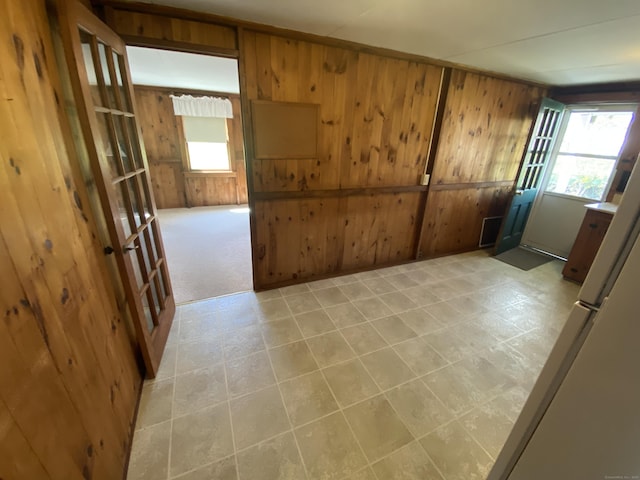 318 Billow Rd, Old Lyme, CT 06371 - unfurnished room featuring wood walls and plenty of natural light