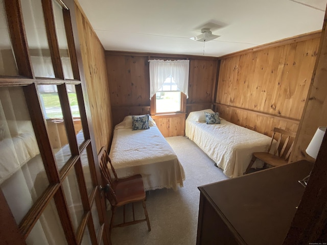 318 Billow Rd, Old Lyme, CT 06371 - bedroom with carpet floors and wood walls