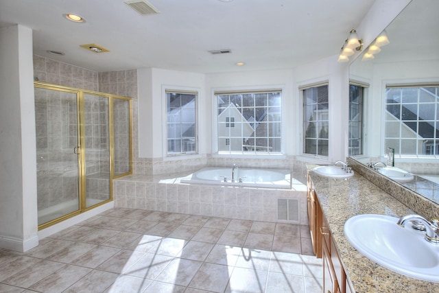full bathroom with visible vents, a sink, and a bath