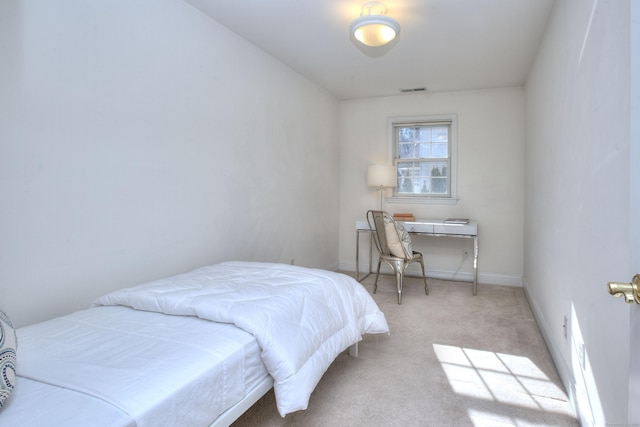 bedroom featuring carpet flooring, baseboards, and visible vents