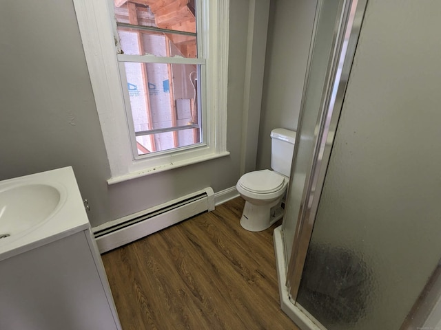 327 Center St, West Haven, CT 06516 - bathroom with vanity, toilet, a shower stall, wood finished floors, and a baseboard radiator