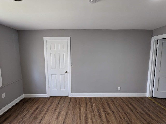 327 Center St, West Haven, CT 06516 - spare room featuring baseboards and dark wood-style flooring