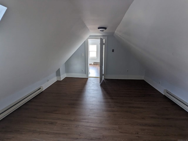 327 Center St, West Haven, CT 06516 - additional living space featuring baseboards, baseboard heating, lofted ceiling, and dark wood-type flooring